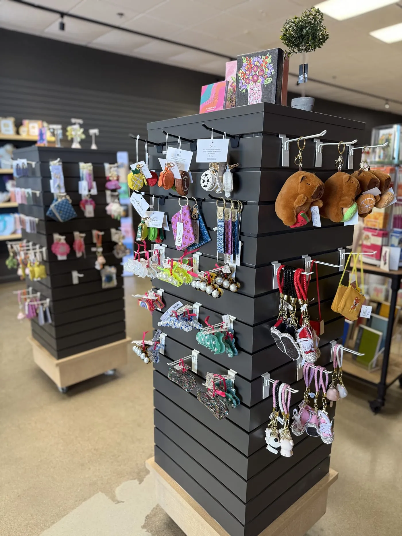 Inside Gugu Gifts gift shop in Terrell, TX — gift towers and curated displays