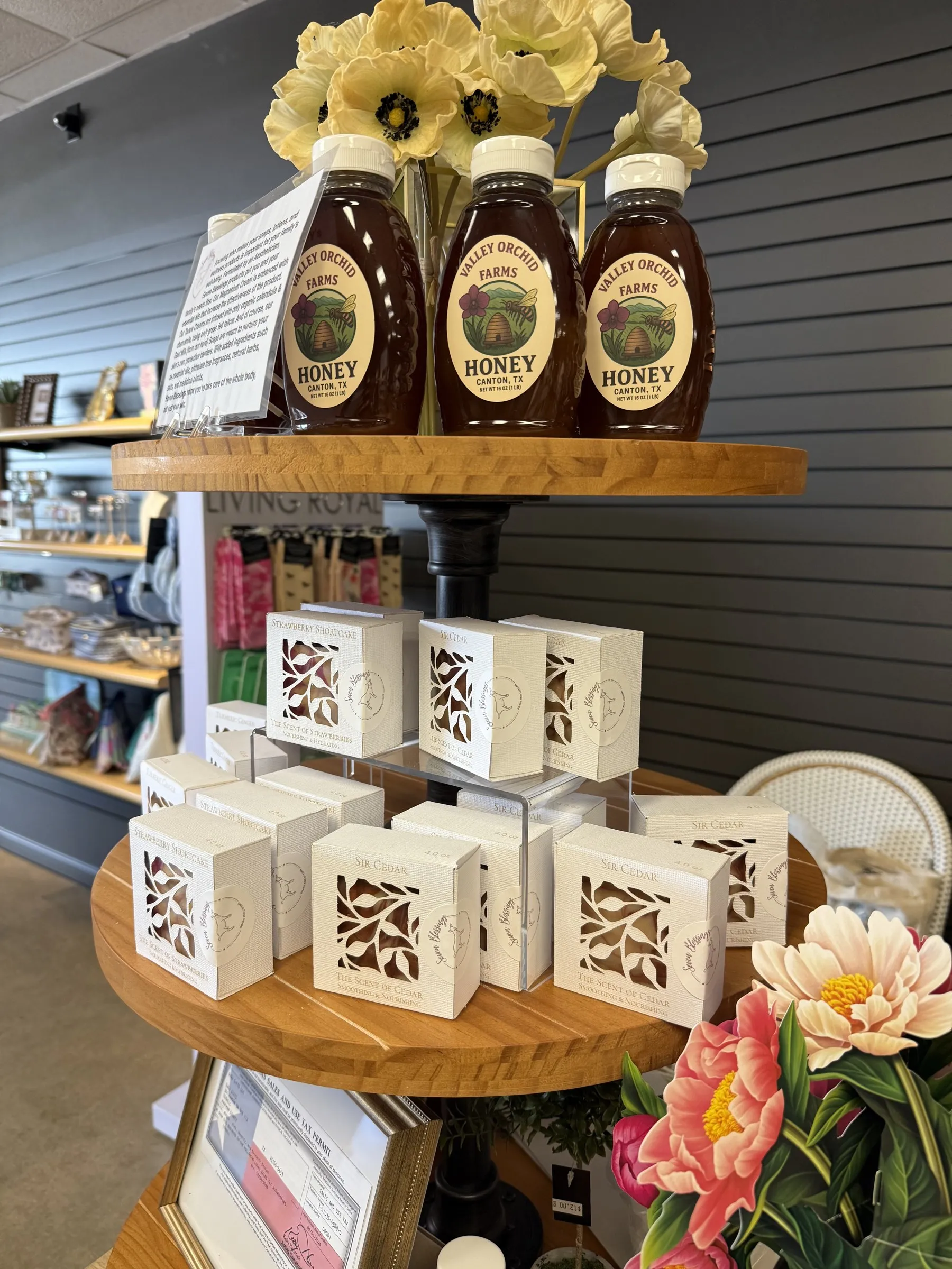 Valley Orchid Farms honey bottles on display at Gugu Gifts in Terrell, TX
